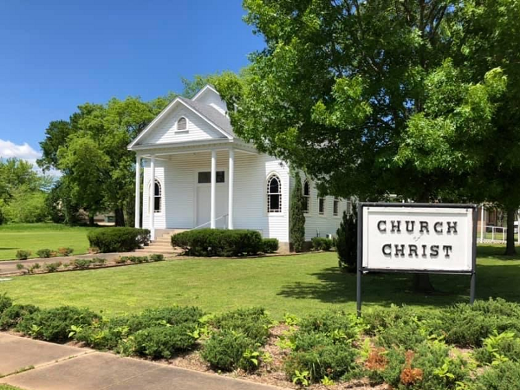 Church building and sign at the church of Christ in Fort Towson, Oklahoma